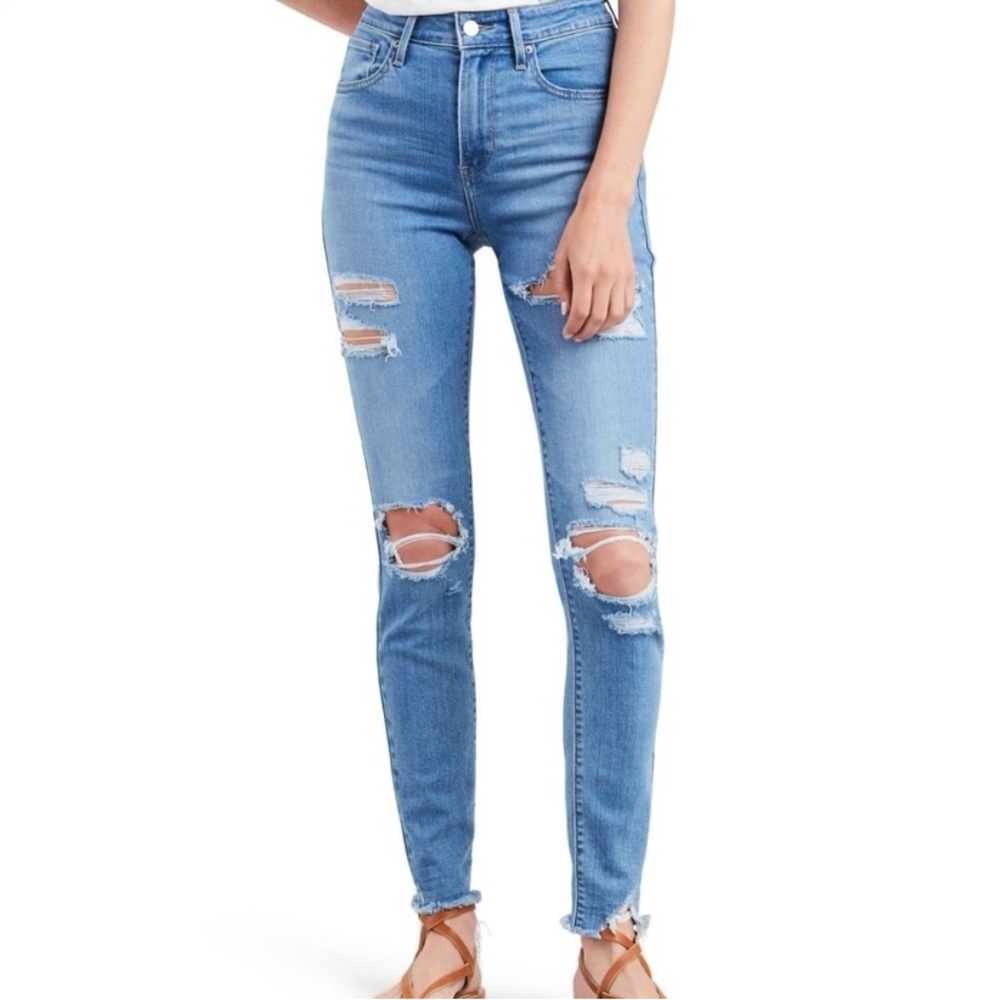Levi’s 721 High Rise Ripped Raw Hem Skinny Jeans
